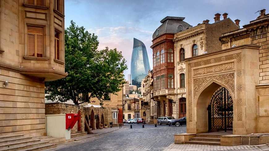 Narrow cobblestone streets of İçərişəhər (Old City) in Baku with medieval stone walls and the Maiden Tower visible in the background
things to do in Baku
Baku travel guide 2026